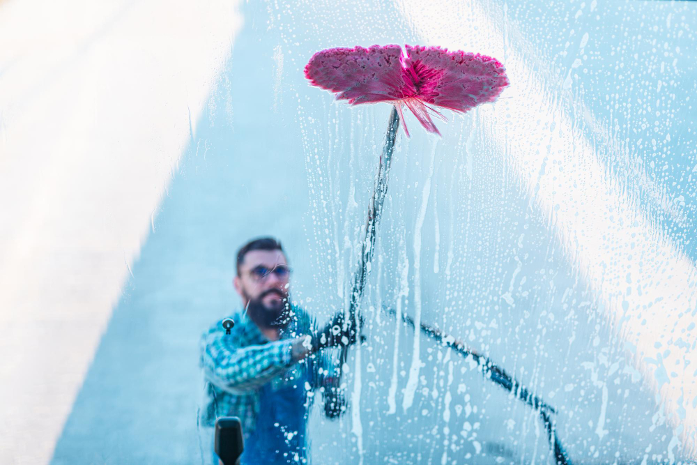 Telescoop glasbewassing